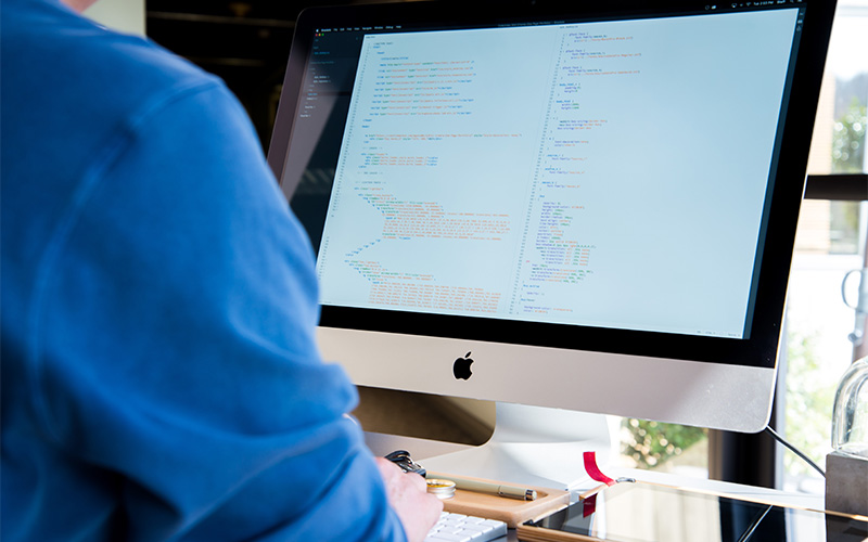 Developer coding a website